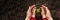 Hands from two generations embrace young plant