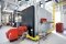 The picture shows the 1950 kW Vitoplex 300 peak load boiler in the logistics centre of Kiesel GmbH.