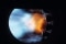 A blue-yellow flame produced by an oil boiler.